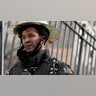 A firefighter at the scene of the Bronx apartment fire