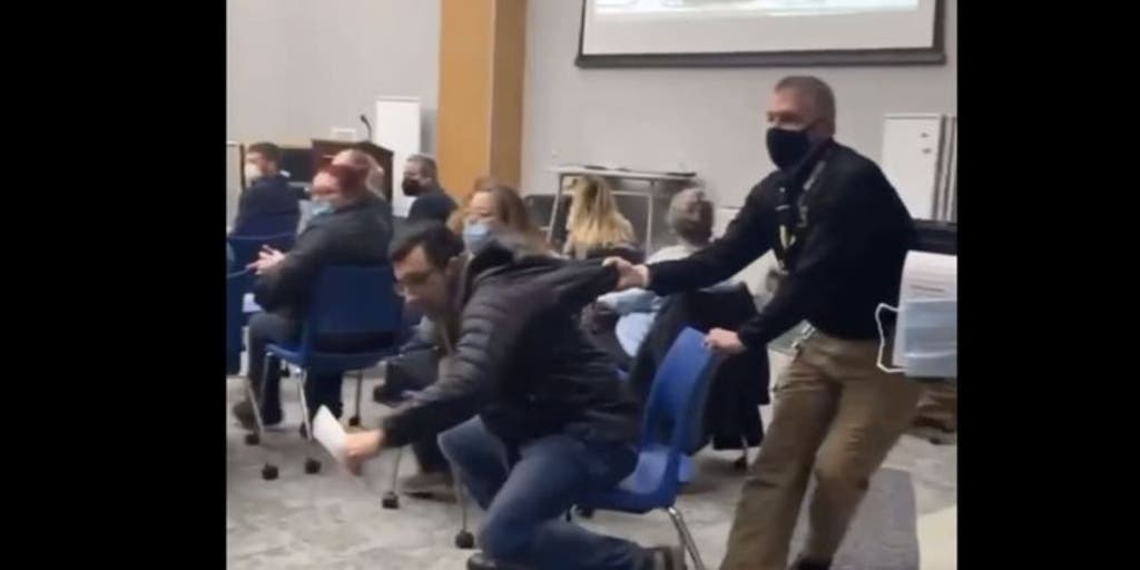 Maskless New York parent booted from school board meeting days after school officials posed maskless - Vimarsana News