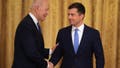 WASHINGTON, DC - JUNE 25: U.S. President Joe Biden (L) shakes hands with Transportation Secretary Pete Buttigieg during an event commemorating LGBTQ+ Pride Month at the White House on June 25, 2021 in Washington, DC. Buttigieg is the first openly gay White House cabinet member in U.S. history. (Photo by Chip Somodevilla/Getty Images)