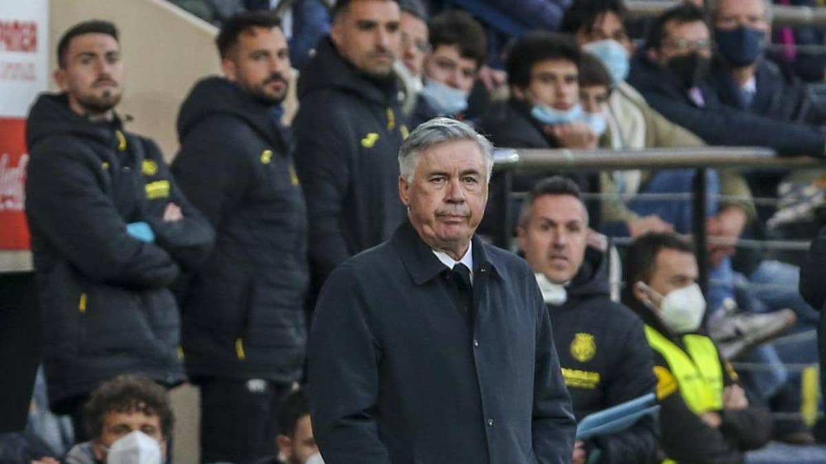 Real Madrid's head coach Carlo Ancelotti watches the play during a Spanish La Liga soccer match between Villarreal and Real Madrid at the Ceramica stadium in Villarreal, Spain, Saturday, Feb. 12, 2022.