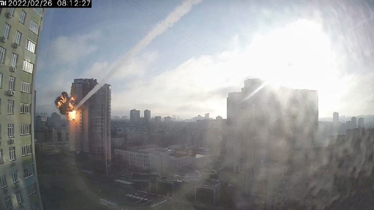 Surveillance footage shows a missile hitting a residential building in Kyiv