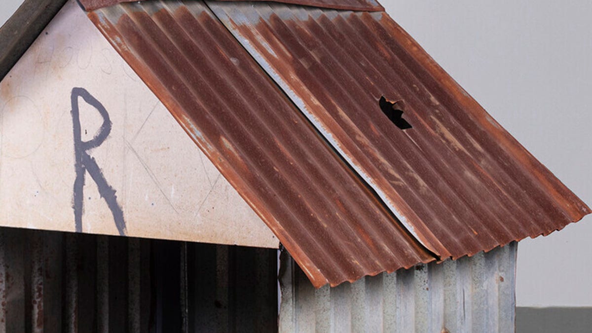 close up of dog house struck by meteorite