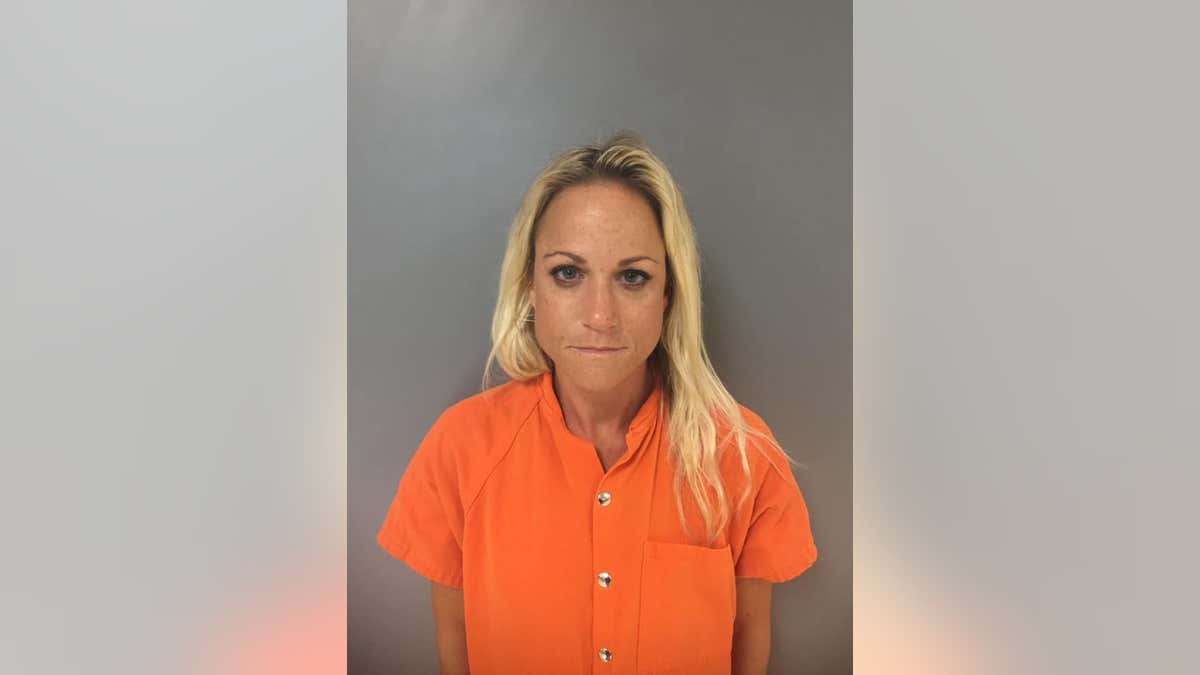 Cynthia Perkins, 36, agreed to plead guilty and testify against her ex, 44-year-old former Livingston Parish Sheriff’s Office SWAT member Dennis Perkins, who is also charged with dozens of child sex crimes, according to prosecutors.