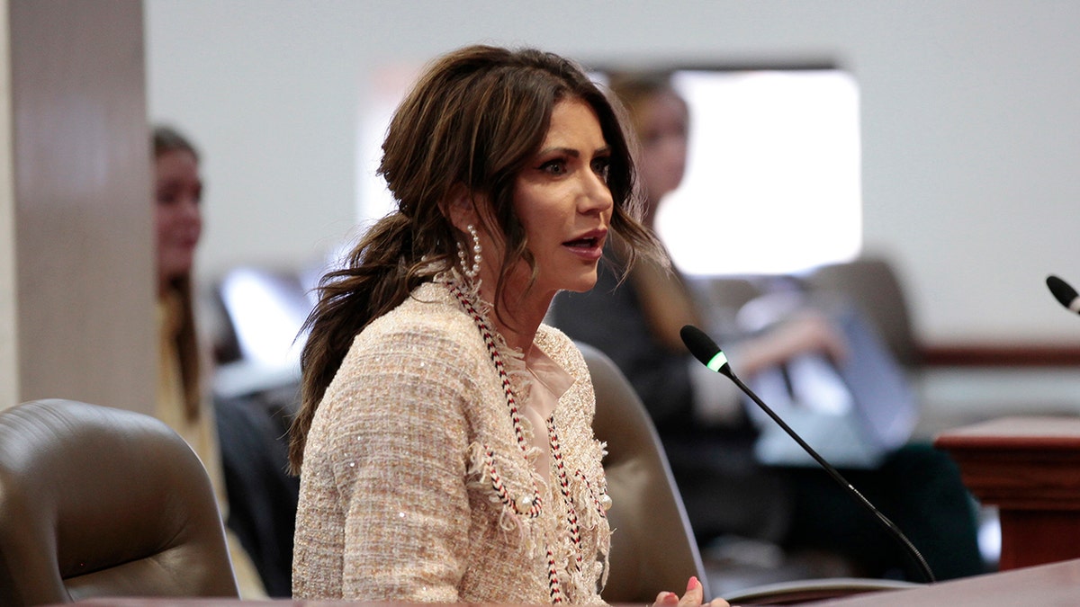 South Dakota Gov. Kristi Noem testifies to a state Senate committee on Wednesday, Feb. 2, 2022, in Pierre, South Dakota.