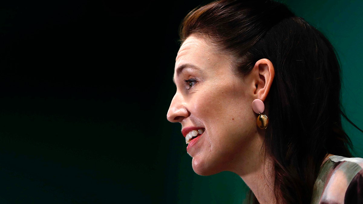 New Zealand Prime Minister Jacinda Ardern outlines the government's plans, Thursday, Feb. 3, 2022, that will dismantle its quarantine system and reopen its borders to the world. (Associated Press)