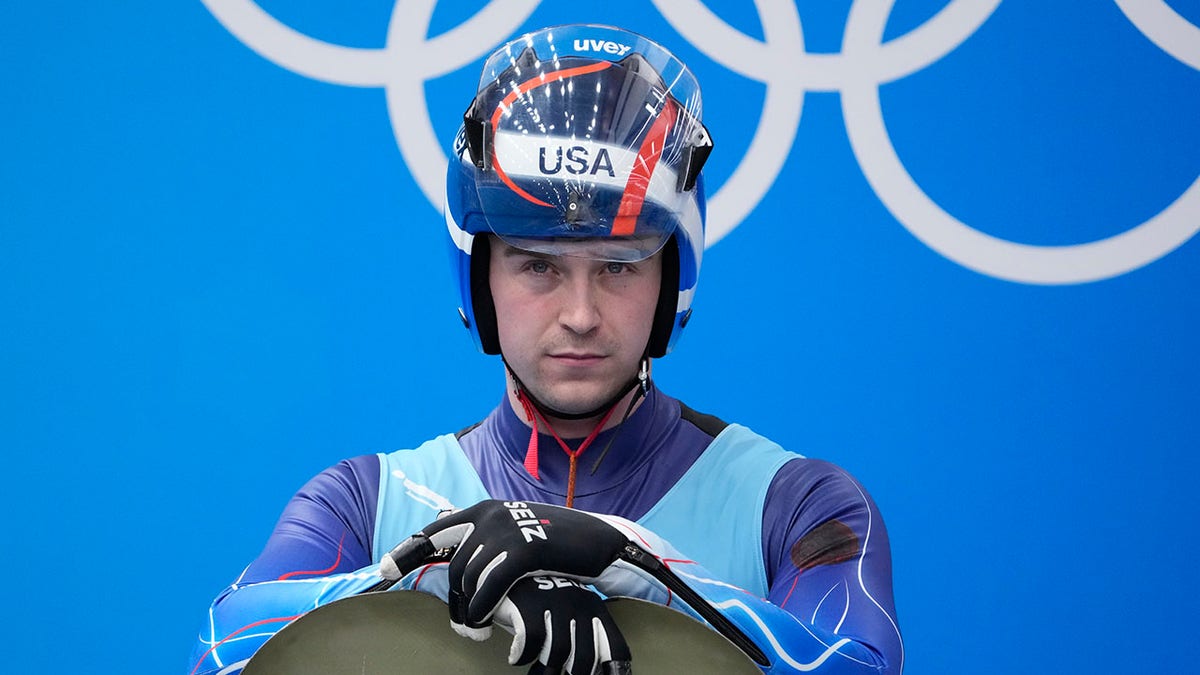 Tucker West, of the United States, prepares to start the luge men's single round 3 at the 2022 Winter Olympics, Sunday, Feb. 6, 2022, in the Yanqing district of Beijing.