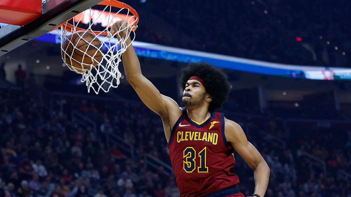 Cleveland Cavaliers' Jarrett Allen (31) dunks against the Indiana Pacers during the first half of an NBA basketball game, Sunday, Feb 6, 2022, in Cleveland.