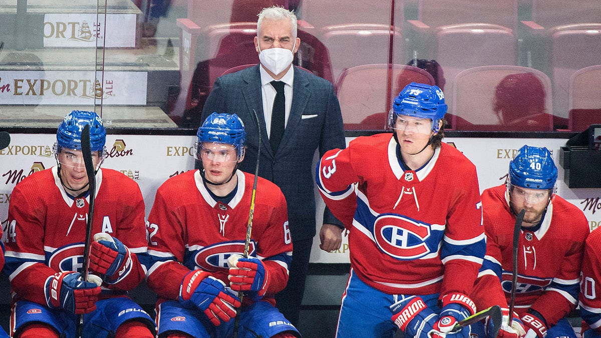 Montreal Canadiens head coach Dominique Ducharme looks on from behind the bench during an NHL hockey game against the New Jersey Devils in Montreal, Tuesday, Feb. 8, 2022. The Montreal Canadiens have fired head coach Dominique Ducharme. The 48-year-old was relieved of his duties Wednesday, Feb. 9, 2022 after Montreal began its season with a dismal 8-30-7 record for a league-worst 23 points.