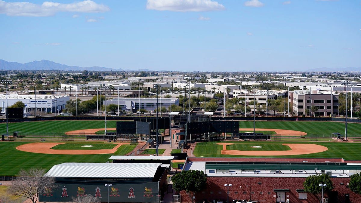 Practice fields remain empty as pitchers and catchers are not starting spring training workouts as scheduled as the Major League Baseball lockout enters its 77th day and will prevent pitchers and catchers from taking the field for the first time since October as the Los Angeles Angels facility is quiet Wednesday, Feb. 16, 2022, in Tempe, Ariz.