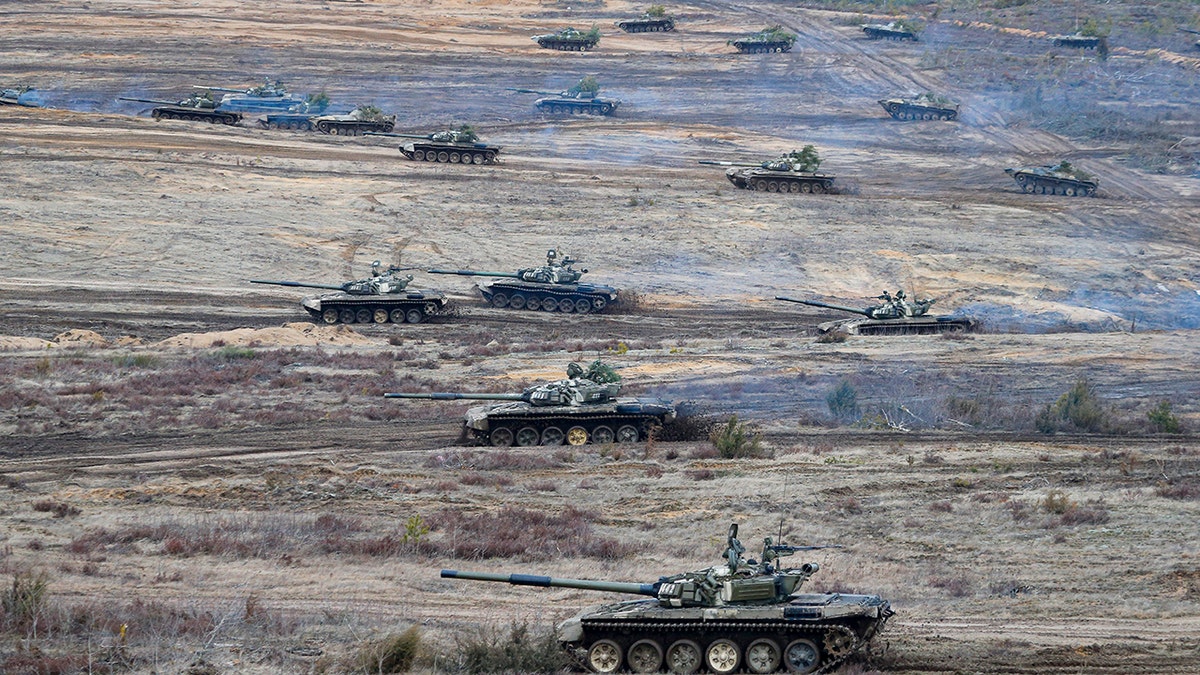Tanks move during the Union Courage-2022 Russia-Belarus military drills at the Obuz-Lesnovsky training ground in Belarus.