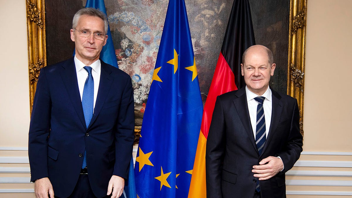German Chancellor Olaf Scholz, right, and Jens Stoltenberg, NATO Secretary General, meet for bilateral talks at the Munich Security Conference in Munich, Germany, Saturday, Feb. 19, 2022. 