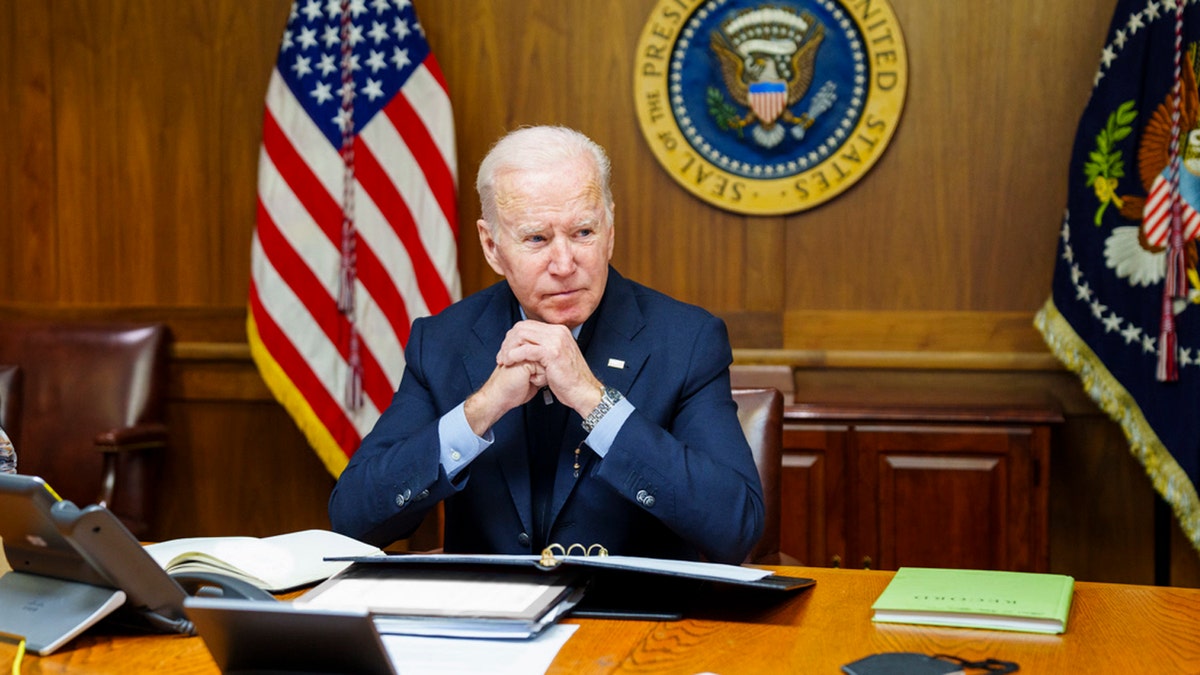 This image provided by The White House via Twitter shows President Joe Biden at Camp David, Md., Feb. 12, 2022.