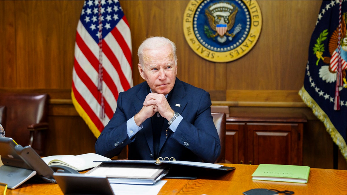 This image provided by The White House via Twitter shows President Joe Biden at Camp David, Md., Feb. 12, 2022.