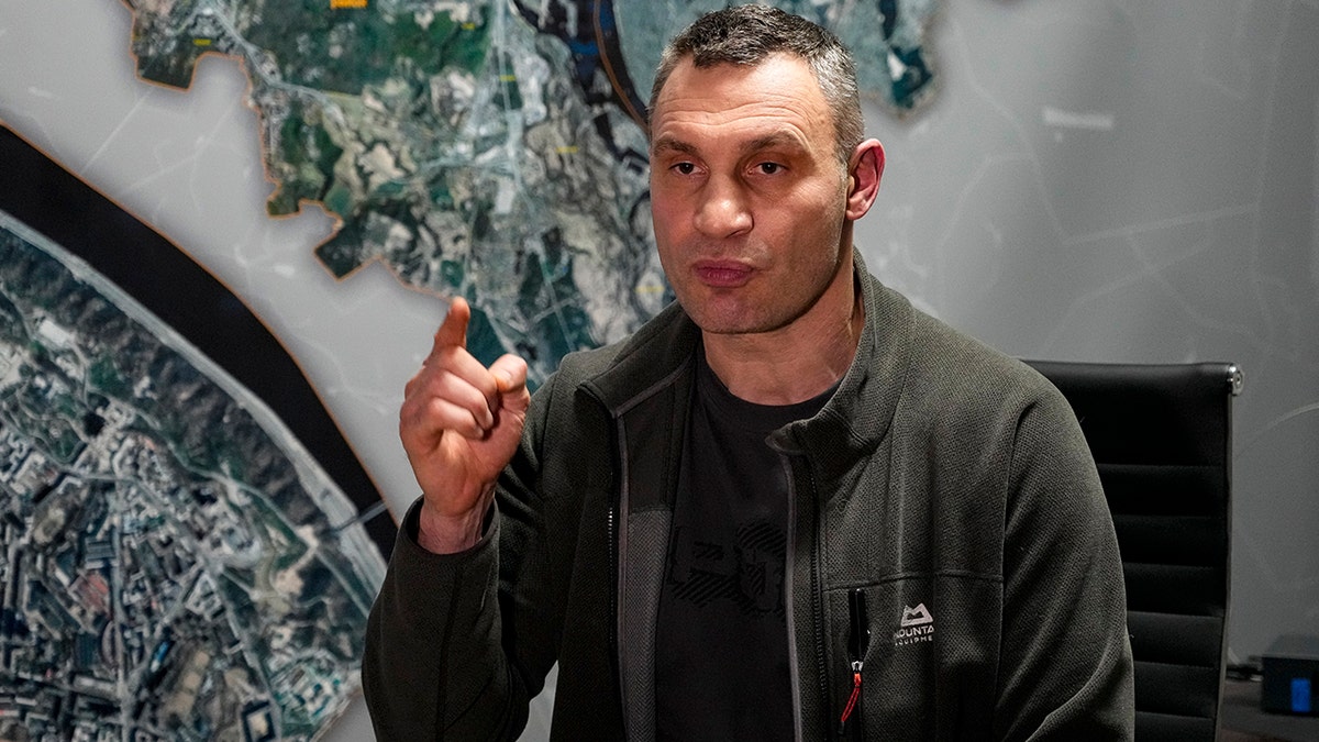 Vitali Klitschko, Kyiv Mayor and former heavyweight champion gestures while speaking during his interview with the Associated Press in his office in the City Hall in Kyiv, Ukraine, Sunday, Feb. 27, 2022. A Ukrainian official says street fighting has broken out in Ukraine's second-largest city of Kharkiv. Russian troops also put increasing pressure on strategic ports in the country's south following a wave of attacks on airfields and fuel facilities elsewhere that appeared to mark a new phase of Russia's invasion
