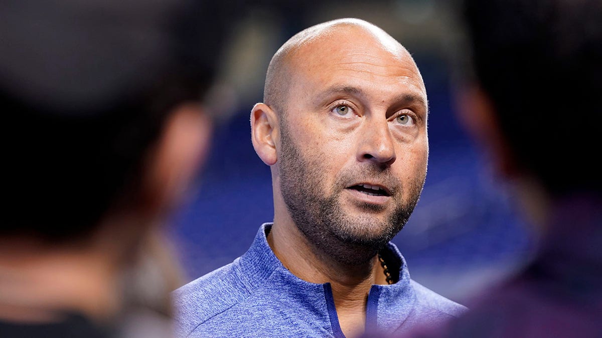FILE - Derek Jeter, CEO of the Miami Marlins, speaks with the news media before a baseball game against the Philadelphia Phillies, Saturday, Oct. 2, 2021, in Miami. Derek Jeter announced a surprise departure from the Miami Marlins Monday, Feb. 28, 2022.