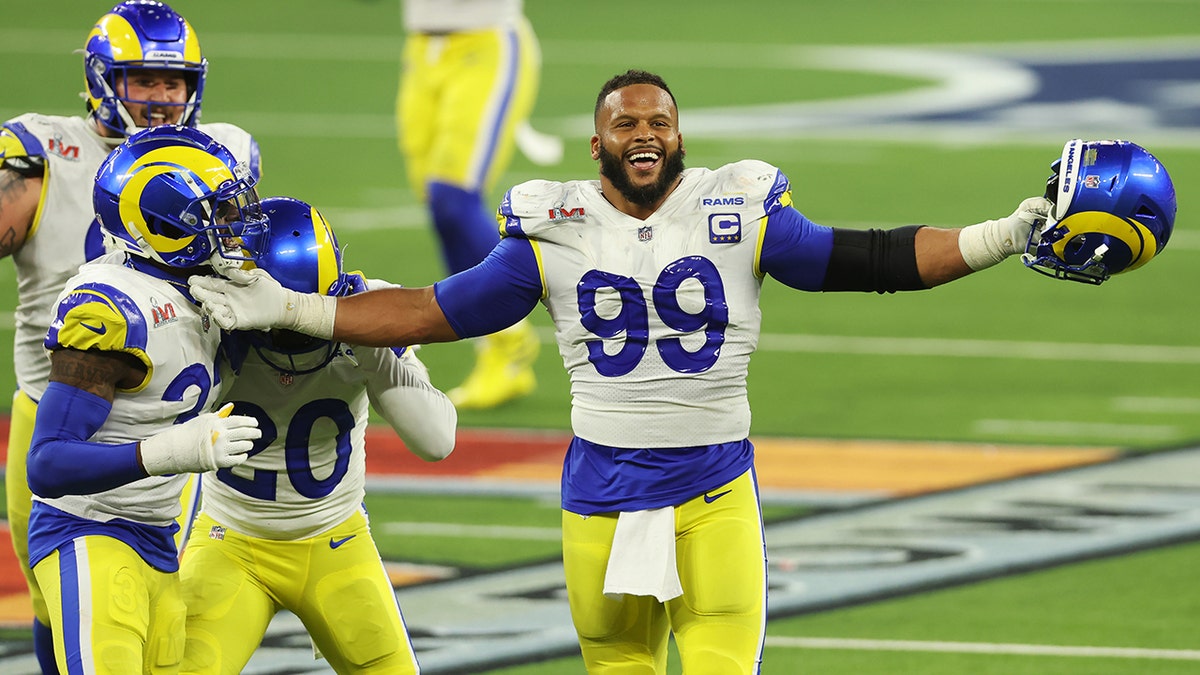 Aaron Donald #99 of the Los Angeles Rams reacts following a fourth down stop during the fourth quarter of Super Bowl LVI against the Cincinnati Bengals at SoFi Stadium on February 13, 2022 in Inglewood, California.