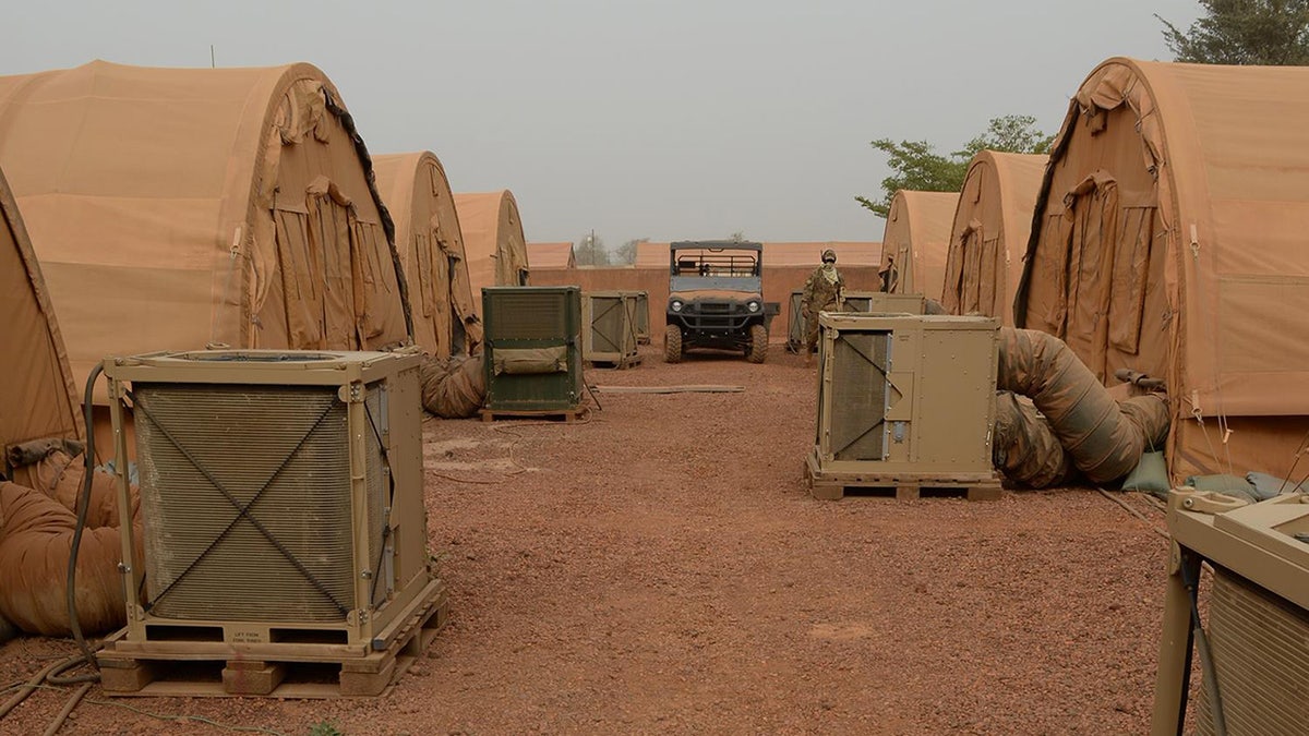 Heating Ventilation and Air Conditioning units operate behind tents at Nigerien Air Base 101, in Niger, April 3, 2017.