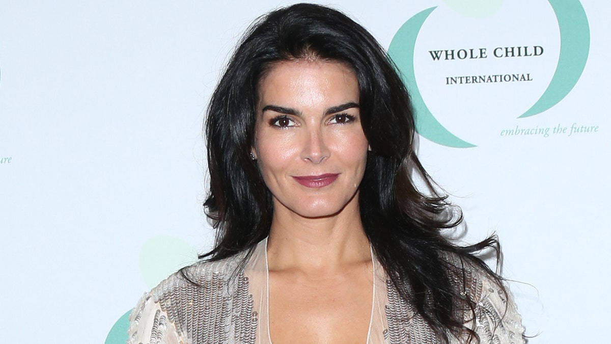 Angie Harmon smiling