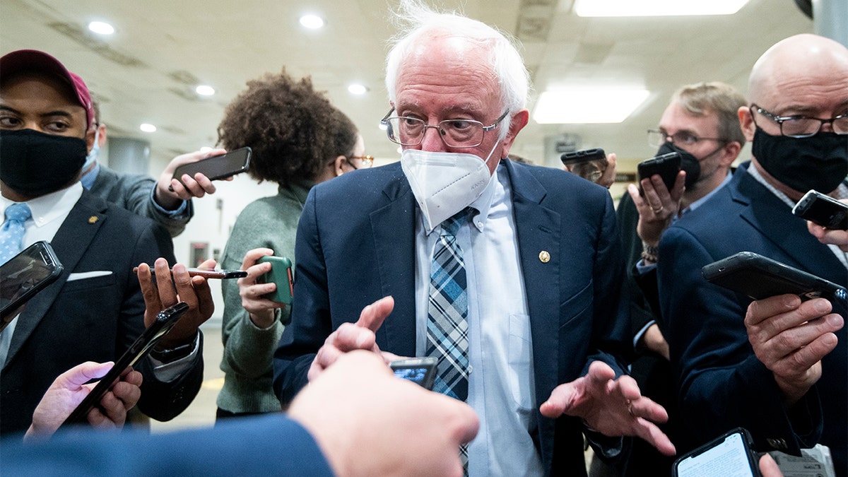 Sen. Bernie Sanders talking to reporters