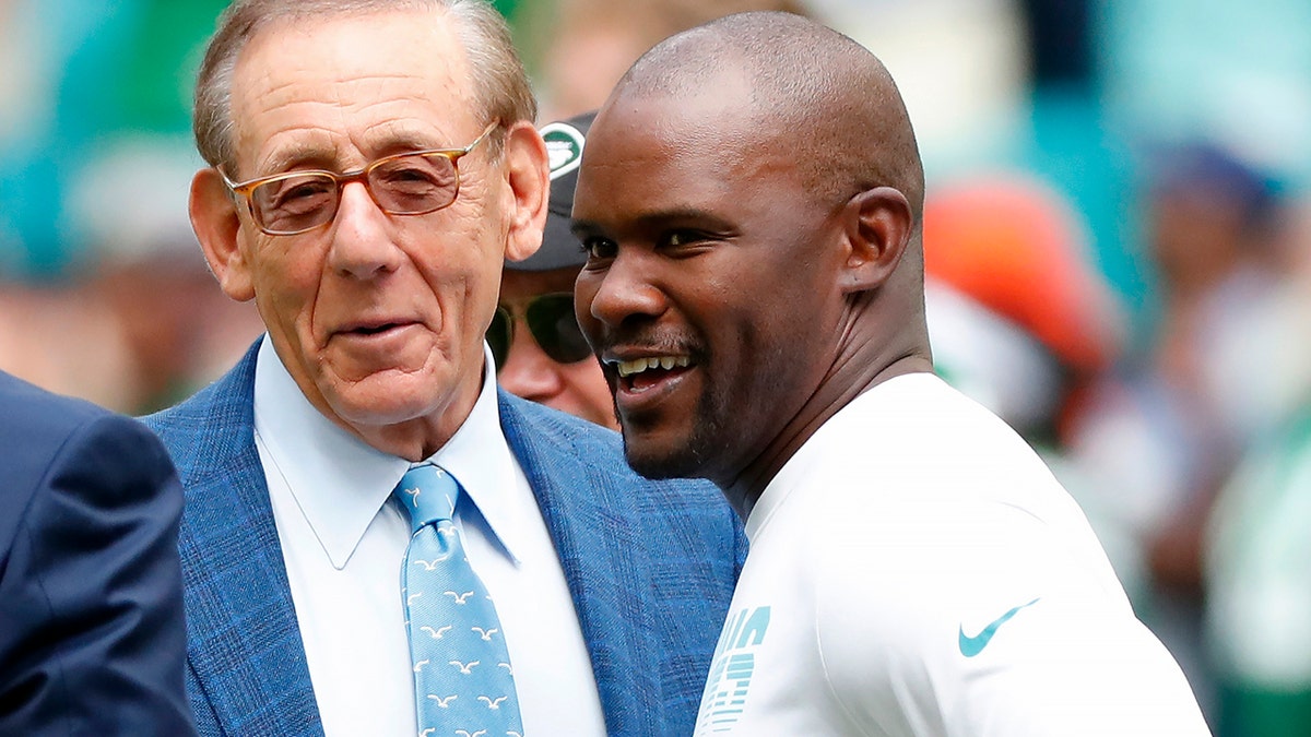 Brian Flores talks to Miami Dolphins owner Stephen M. Ross