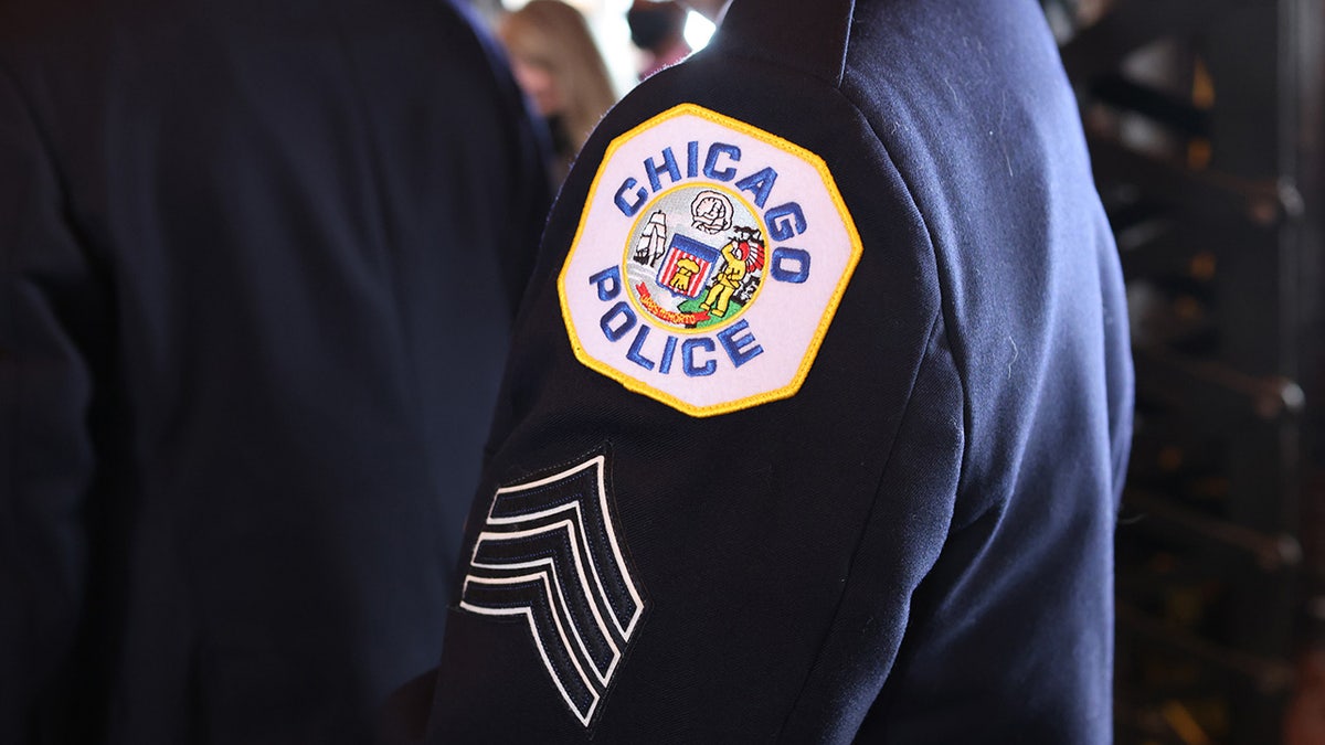 The 23-year-old Chicago police officer was treated at a hospital for an injury to his leg, according to police and local reports.