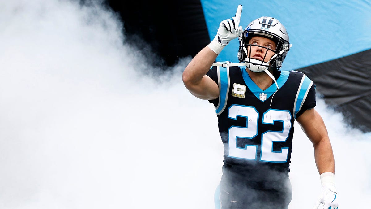 Christian McCaffrey #22 of the Carolina Panthers is introduced prior to the game against the Washington Football Team at Bank of America Stadium on November 21, 2021 in Charlotte, North Carolina.