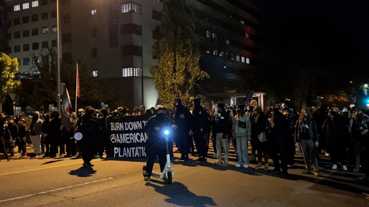 Anti-fascist and black bloc demonstrators march in Washington, D.C. on November 4, 2020 