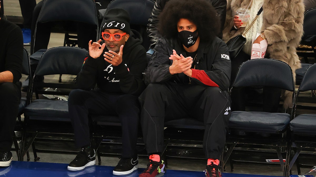 Director Spike Lee and Colin Kapernick sit courtside on February 2, 2022, at Madison Square Garden in New York City.