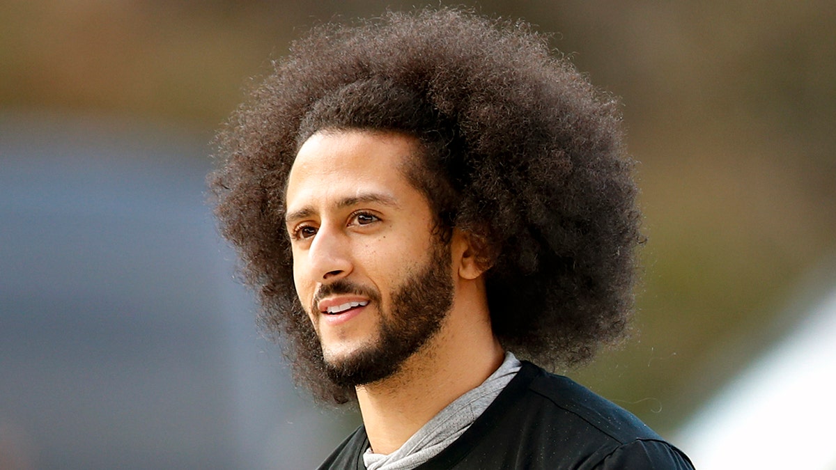 FILE -Free agent quarterback Colin Kaepernick arrives for a workout for NFL football scouts and media in Riverdale, Ga., on Nov. 16, 2019.