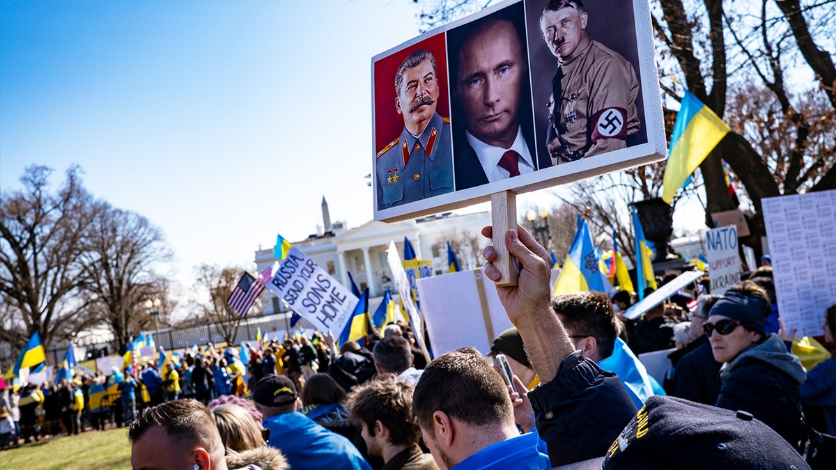 People participate in a pro-Ukrainian protest in Lafayette Park near the White House on February 27, 2022, in Washington, DC. 