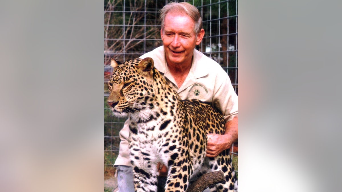 Don Lewis, big cat rescuer Carole Baskin's second husband, pictured with a leopard.