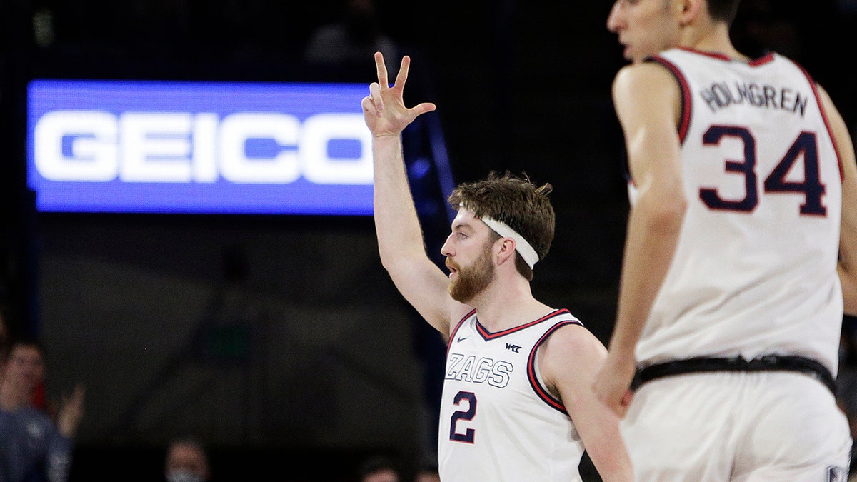 Gonzaga forward Drew Timme (2) celebrates his 3-point basket during the first half of the team's NCAA college basketball game against Santa Clara, Saturday, Feb. 19, 2022, in Spokane, Wash.