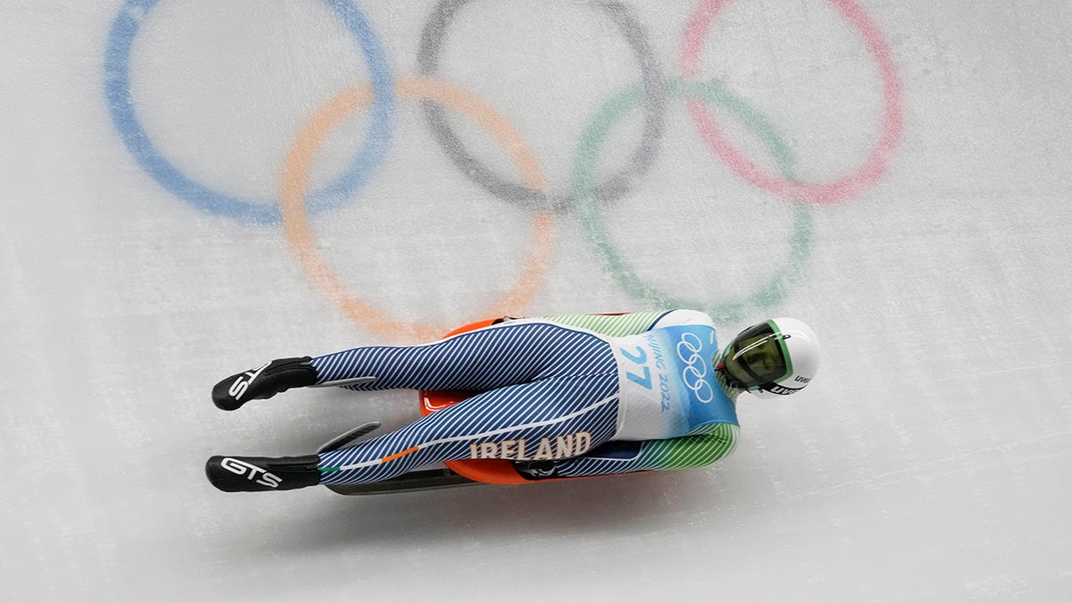 Elsa Desmond, of Ireland, slides during the luge women's singles run 1 at the 2022 Winter Olympics, Monday, Feb. 7, 2022, in the Yanqing district of Beijing.(AP Photo/Dmitri Lovetsky)