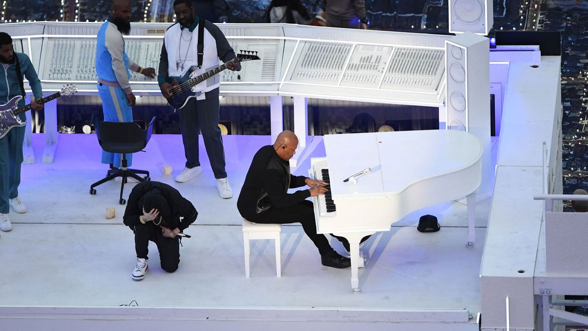 Eminem kneels during Super Bowl LVI halftime show