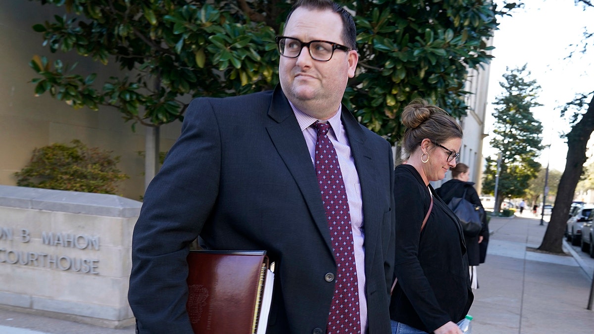 Former Los Angeles Angels employee Eric Kay walks out of federal court where he is on trial for federal drug distribution and conspiracy charges, in Fort Worth, Texas, Tuesday, Feb. 15, 2022. Kay is accused of providing Tyler Skaggs the drugs that led to the pitcher's overdose death. The 27-year-old Skaggs was found dead in July 2019 in a suburban Dallas hotel room. He had choked to death on his vomit, and a toxic mix of alcohol, fentanyl and oxycodone was in his system.