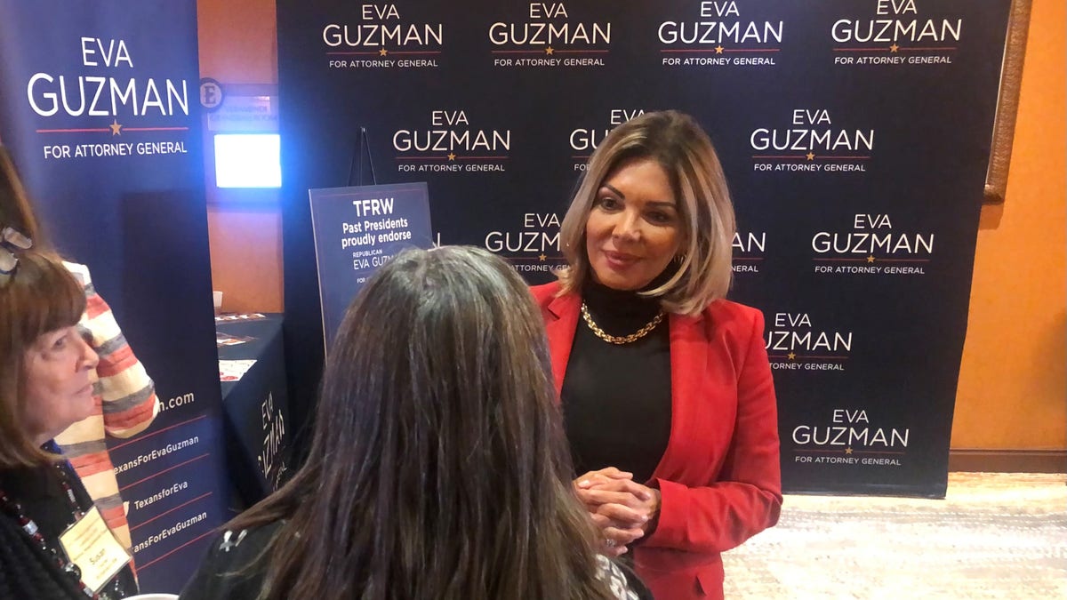 Former Texas Supreme Court justice Eva Guzman, who's running for state attorney general, greets voters at the Texas Federation of Republican Women convention in San Marcos, Texas in January, 2022 
