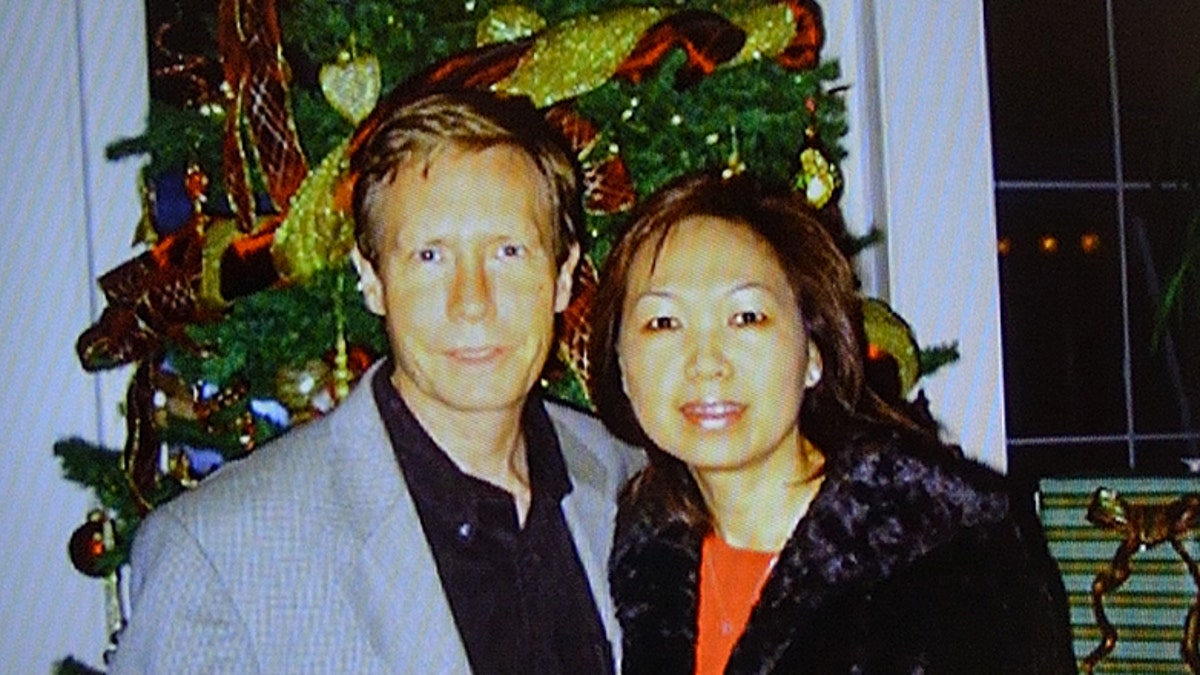 A photo of Peter and Quee Choo Chadwick is shown during a news conference announcing the capture of Peter Chadwick in Santa Ana, California, on Tuesday, Aug 6, 2019. 