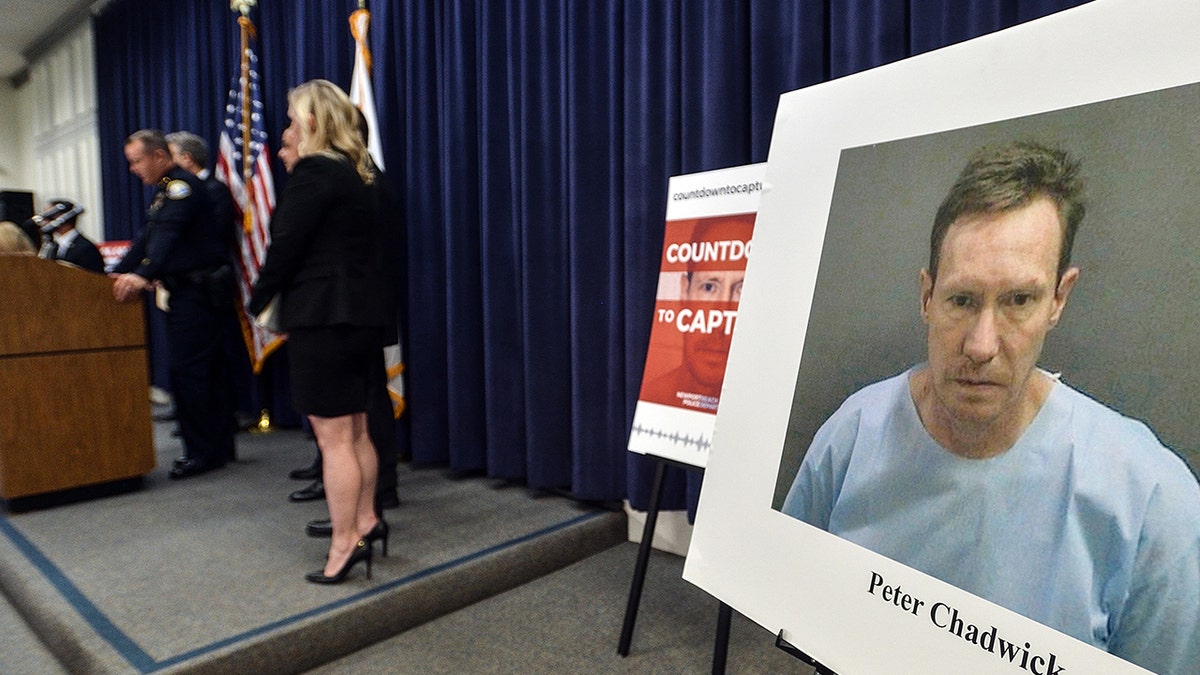 A photo of Peter and Quee Choo Chadwick is shown during a news conference announcing the capture of Peter Chadwick in Santa Ana, California, on Tuesday, Aug 6, 2019. 