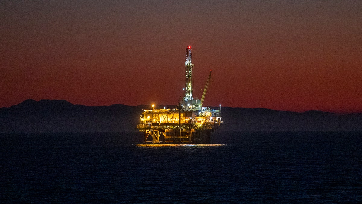 A view of oil platform Emmy off the coast of Huntington Beach at dusk Thursday, October 14, 2021. (Allen J. Schaben / Los Angeles Times via Getty Images)