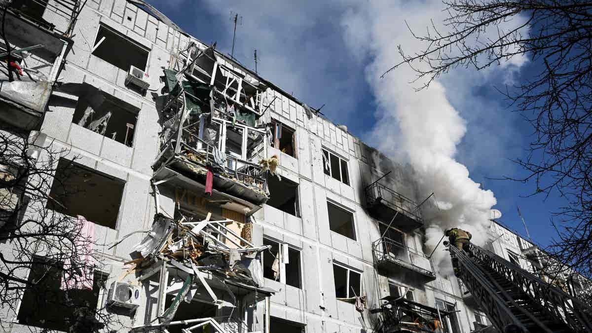 Firefighters working on building in Chuguiv, Ukraine after attacks