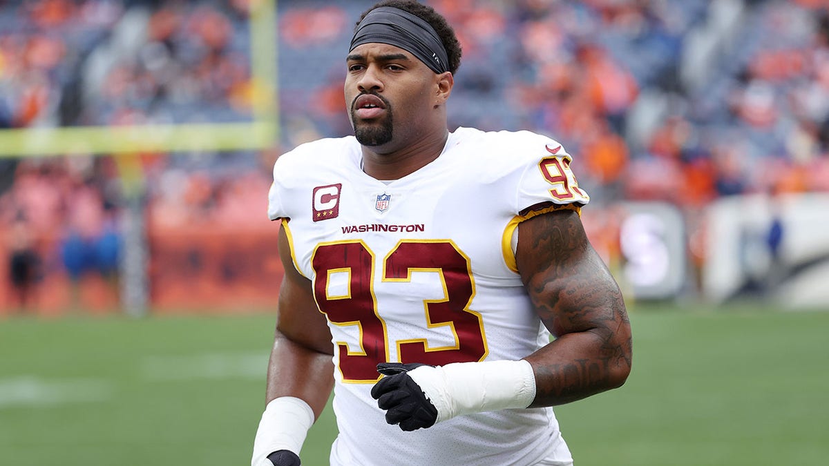 Jonathan Allen #93 of the Washington Football Team warms up before the game against the Denver Broncos at Empower Field At Mile High on Oct. 31, 2021 in Denver, Colorado.
