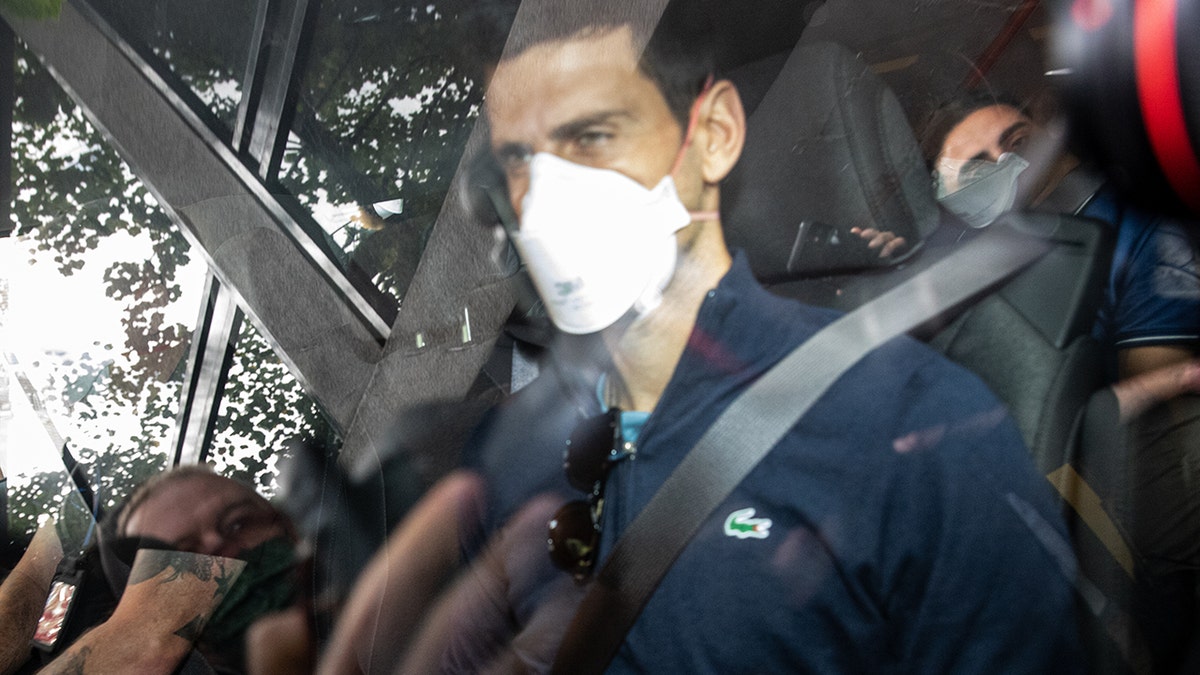 Serbian tennis player Novak Djokovic leaves the Park hotel on January 16, 2022 in Melbourne, Australia. (Photo by Diego Fedele/Getty Images)