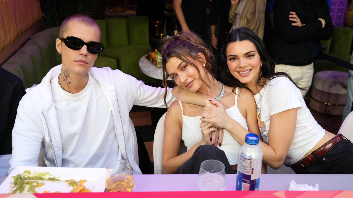 Justin Bieber, Hailey Bieber and Kendall Jenner attend Super Bowl LVI at SoFi Stadium on February 13, 2022 in Inglewood, California.