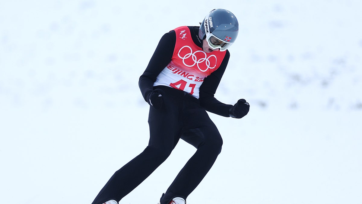 Jarl Magnus Riiber of Team Norway celebrates competes during Individual Gundersen Large Hill/10km, Ski Jumping Competition Round on day 11 of 2022 Beijing Winter Olympics at The National Cross-Country Skiing Centre on February 15, 2022 in Zhangjiakou, China. 