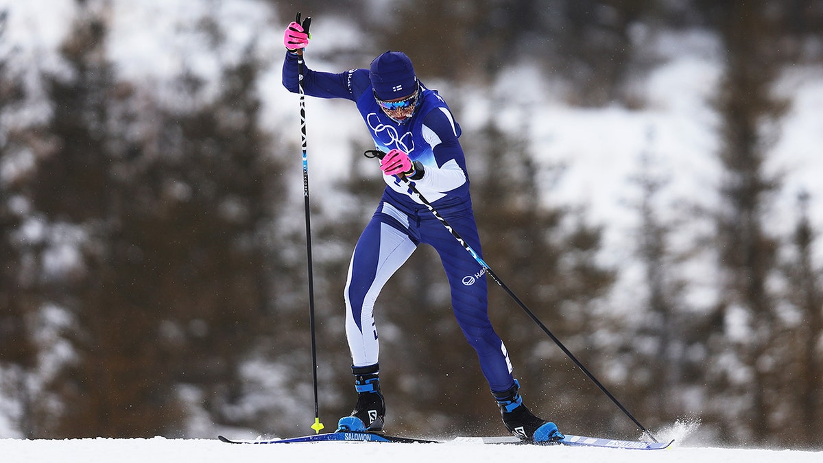 Remi Lindholm of Team Finland competes during the Men's Cross-Country Skiing 50km Mass Start Free on Day 15 of the Beijing 2022 Winter Olympics at The National Cross-Country Skiing Centre on February 19, 2022, in Zhangjiakou, China. The event distance has been shortened to 30k due to weather conditions.