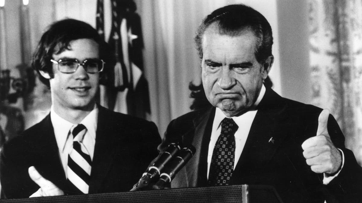 Richard Nixon (1913 - 1994) gives the thumbs up after his resignation as 37th President of the United States. His son-in-law David Eisenhower is with him as he says goodbye to his staff at the White House, Washington DC. (Photo by Gene Forte/Consolidated News Pictures/Getty Images)
