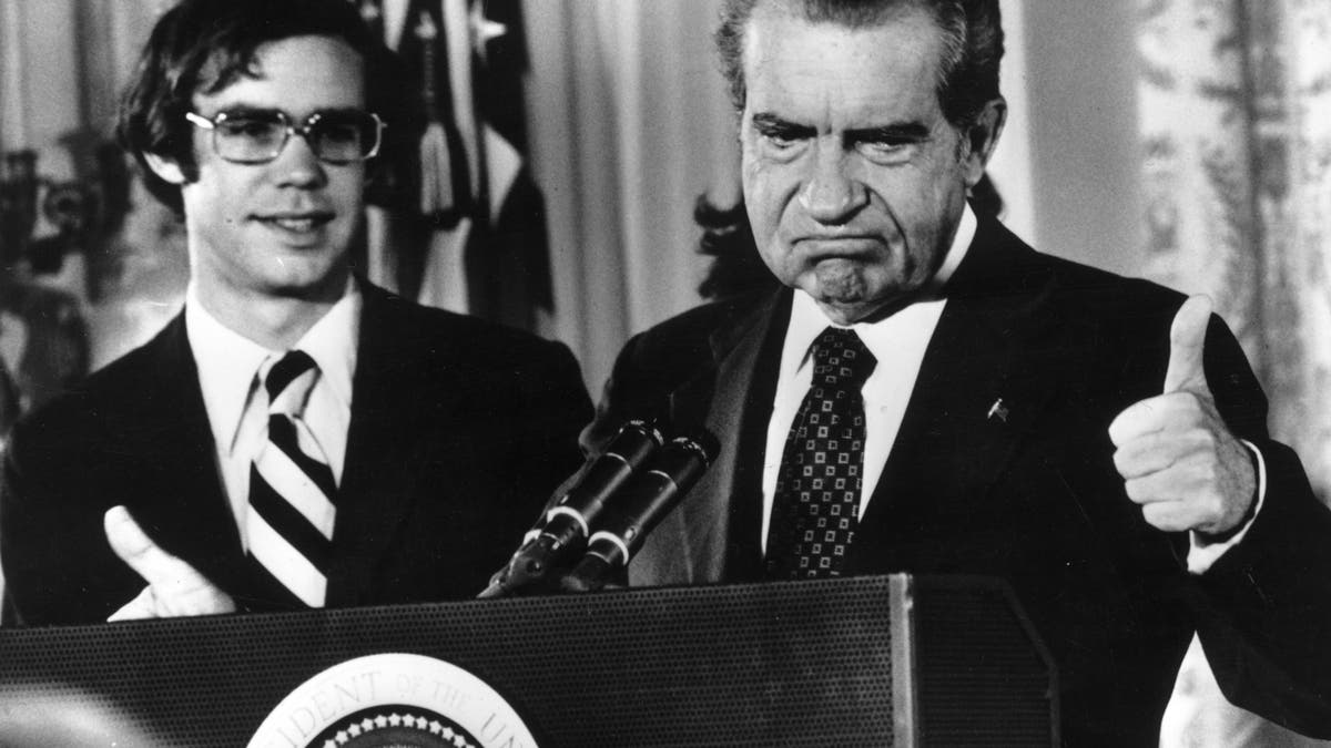 Richard Nixon (1913 - 1994) gives the thumbs up after his resignation as 37th President of the United States. His son-in-law David Eisenhower is with him as he says goodbye to his staff at the White House, Washington DC. (Photo by Gene Forte/Consolidated News Pictures/Getty Images)