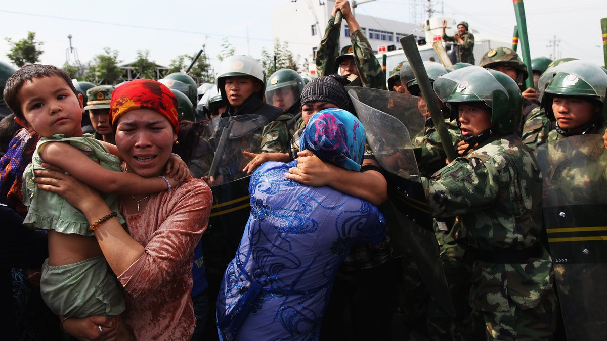 Uyghur women protest China