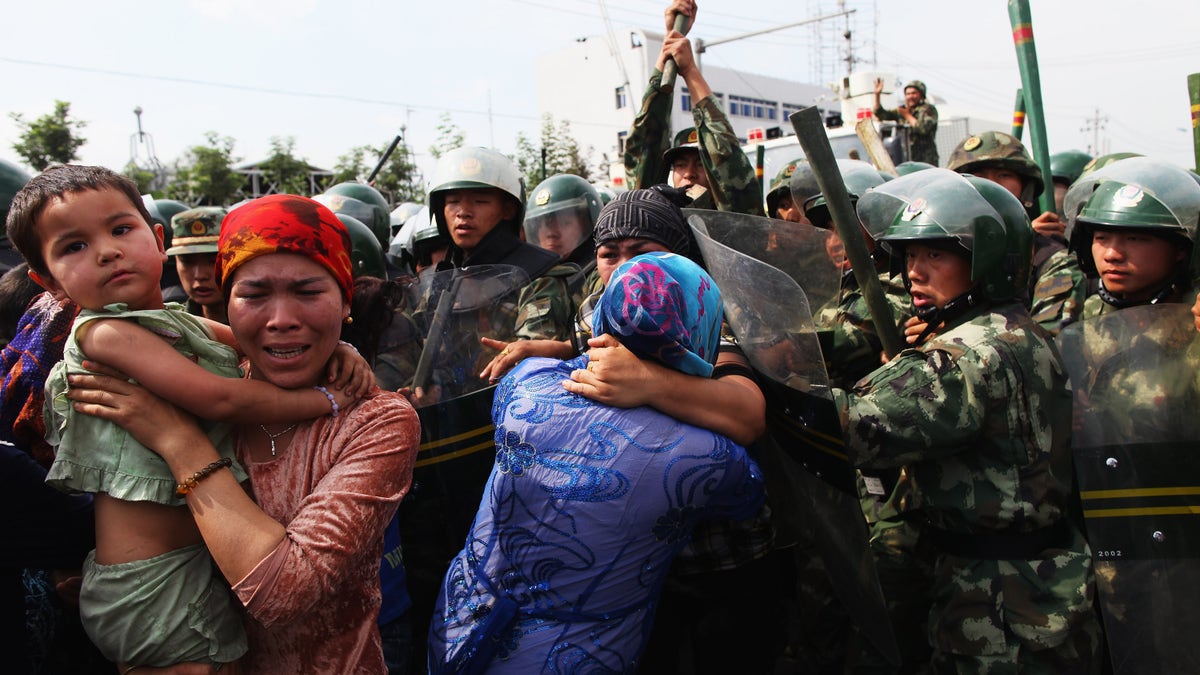 Uyghur women protest China