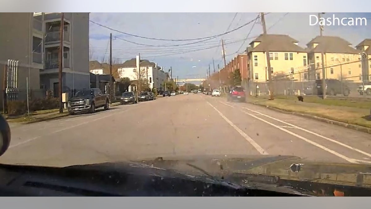 Bullets hit a Houston police vehicle during a Jan. 27 shootout between officers and a carjacking suspect, according to footage released by authorities.